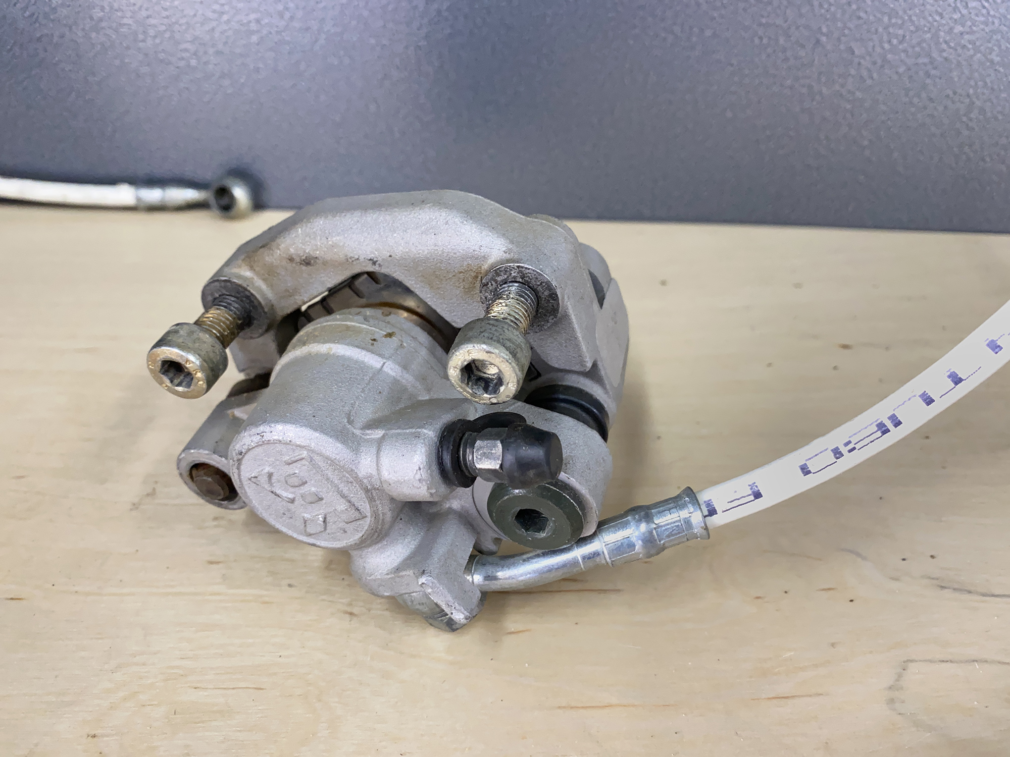 Front brake caliper with hose TM 85/100cc Junior 2013-> - 1